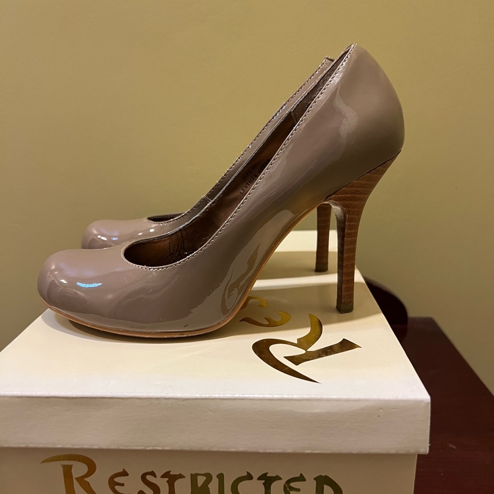 Restricted taupe pump 4 inch heel with box lightly worn
